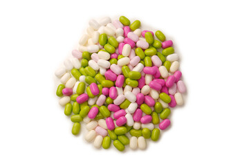 Sweet multicolored candies isolated on white background.
