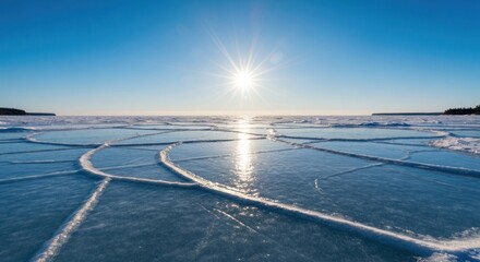 Frozen lake, sunlit cracks in ice