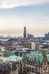 Obraz premium Rooftop view over Hamburg city center with historic Town Hall and church towers, Germany