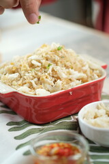 Crab dish, culinary art with garnishing and fresh ingredient preparation