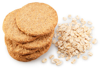 Oatсakes or oat biscuits and several rolled oats isolated on white background. File contains clipping paths.