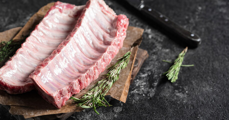 Raw back ribs on a plate