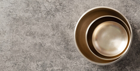 Various bowls made of brass, background