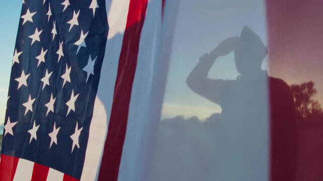 Waving USA Flag Over The Soldier Salute