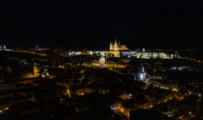 Naklejka premium Beautiful aerial and detailed view of Prague Castle with St. Vitus Cathedral and the Old Royal Palace, Czech Republic — Gothic architecture and panoramic city skyline