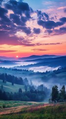 Obraz premium Misty Valley Sunrise Rolling Hills and Colorful Sky Landscape Photography
