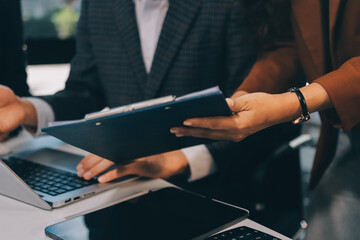 Accounting company provide finance and taxation planning for profitable cash flow, Auditor and accountant team working in office, analyze financial data and accounting record with calculator.Insight