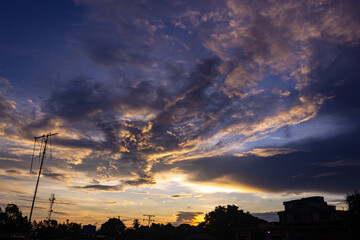 Dramatic sky with clouds at sunset