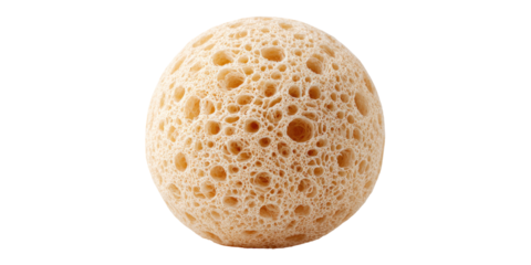 A close-up view of a spherical, porous object with a beige hue, isolated on black