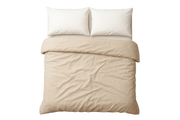 Top view of made bed with beige duvet cover and pillows