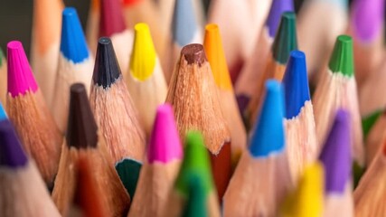 Vibrant Assortment Of Sharpened Colored Pencils In A Bunch With Detailed Wood Grain And Colorful Tips Against A Dark Blurred Background - Powered by Adobe