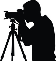 Photographer Silhouette with Camera and Tripod