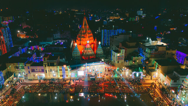 Devotees Offer Prayer to Sun God During Chhath Puja Festival at River Ghat in India