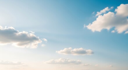Cloudscape serenity: Peaceful cloud formations drift across a serene azure canvas, evoking a sense of calm and boundless expanse.