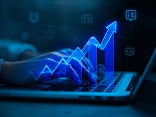Digital growth chart on laptop screen with hand typing