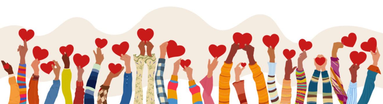 Diverse hands holding red hearts symbolizing unity compassion kindness love and volunteer spirit