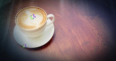 Showing ceramic cup and saucer holding cappuccino on coffee shop table, latte art leaf copy space