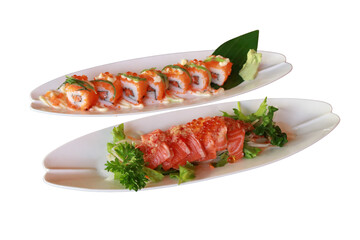 Delicious sushi dishes, with assorted rolls and fresh salmon sashimi on elegant plates