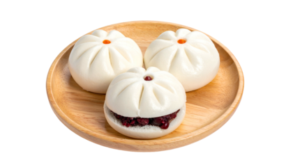 Three fluffy, steamed buns on a wooden plate, one open showing a red filling
