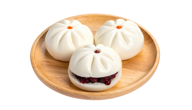 Three fluffy, steamed buns on a wooden plate, one open showing a red filling