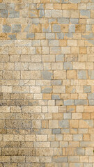 Vertical closeup of a brick wall. Ideal for backgrounds, textures and patterns.