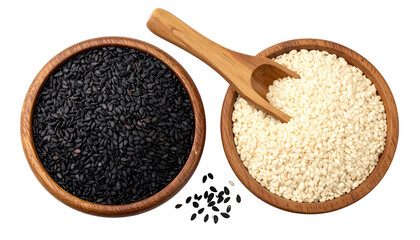 Two wooden bowls, one black, one white, seeds. Wooden scoop rests atop light-colored bowl