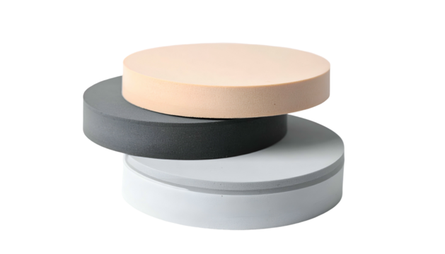 Three stacked, circular, pastel-colored platforms on a black background. Abstract design