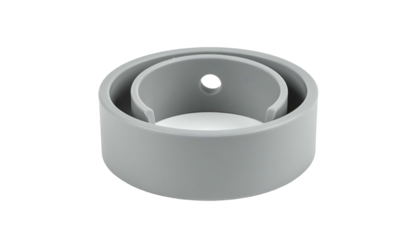 A gray cylindrical object with a smaller inner cylinder, featuring a cutout on one side