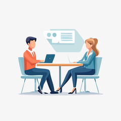 Two people working on laptops at a table.