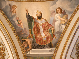 Obraz premium CAVA DE TIRRENI, ITALY - OCTOBER 7, 2025: The fresco of St. Isidore of Seville in the church Abbazia Santissima Trinita by Vincenzo Morani (cca 1860).