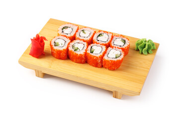 California sushi rolls with tobiko and avocado on wooden board isolated on white background