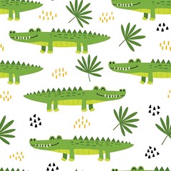 Naklejka premium Cute cartoon alligators and tropical leaves seamless pattern on white background