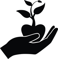 Silhouette of a hand holding a heart shaped seedling growing