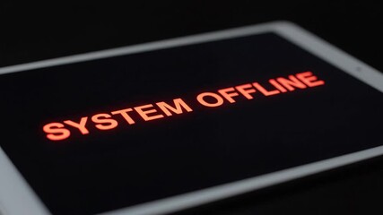 System online text on a device screen distorts with a glitch effect and changes to a red system offline warning. Technology failure and hacking alert concept - Powered by Adobe