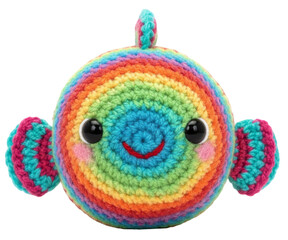 round crocheted fish toy with bright rainbow colors and a happy smile