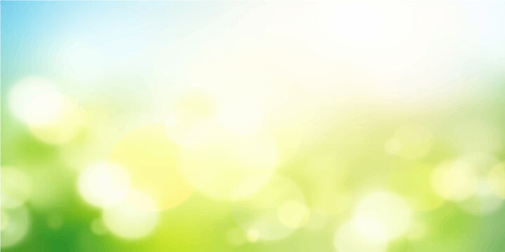 Soft green bokeh light blur pattern, a nature spring background with sunny texture and bright effect