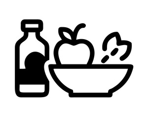 Apple cider bottle and bowl of apples