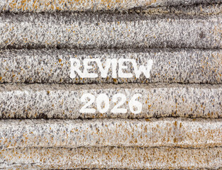 Review 2026 symbol. Concept words Review 2026 on beautiful grey mountain wall. Beautiful grey mountain wall background. Business and review 2026 concept. Copy space.