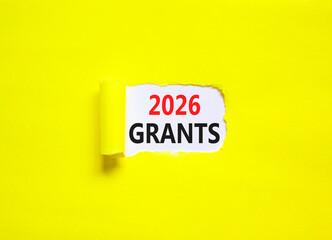 2026 Grants symbol. Concept words 2026 Grants on beautiful white paper. Beautiful yellow paper background. Business and 2026 grants concept. Copy space.