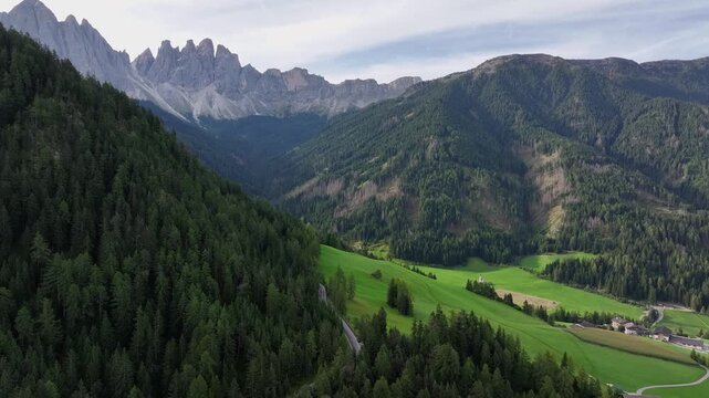 Val di Funes valley with Odle massif in the background