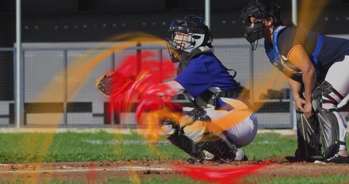 Sports baseball catcher tracking ball, shifting weight and snapping mitt closed amid fire swirl