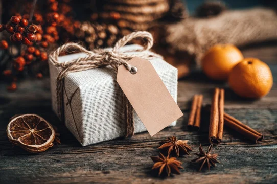 Festive Gift Box Mockup Styled with Cinnamon and Oranges