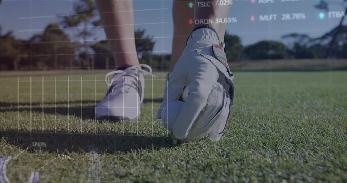 Golfer stepping into frame and activating metrics while placing ball on tee for swing analysis