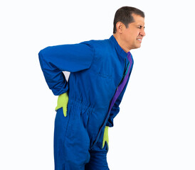 Middle age handsome man wearing mechanic blue uniform suffering of backache, touching back with hand, muscular pain against a white background