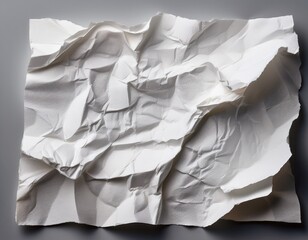Obraz premium a crumpled piece of white paper with a torn edge showcasing a textured surface and subtle creases