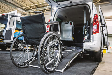 Modern accessible vehicle with an open ramp and wheelchair ready for transport, highlighting convenience and inclusive mobility solutions. Ideal for disabled travel and specialized transportation serv