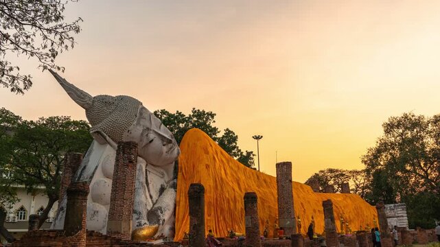 beautiful golden reclining Buddha at Wat Khun Inthapramun is temple that built in Sukhothai period. 
It's exquisite and ancient. The temple is ruin but the Buddha is completely perfect.
robe cloth bac