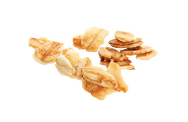 Delicious granola in air against white background