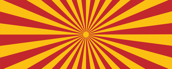 Retro red and yellow sunburst background with radiating rays for vintage design and advertising.