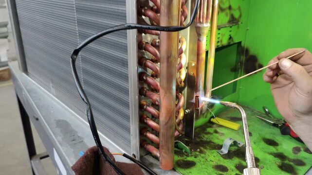 Copper pipe brazing on HVAC heat exchanger